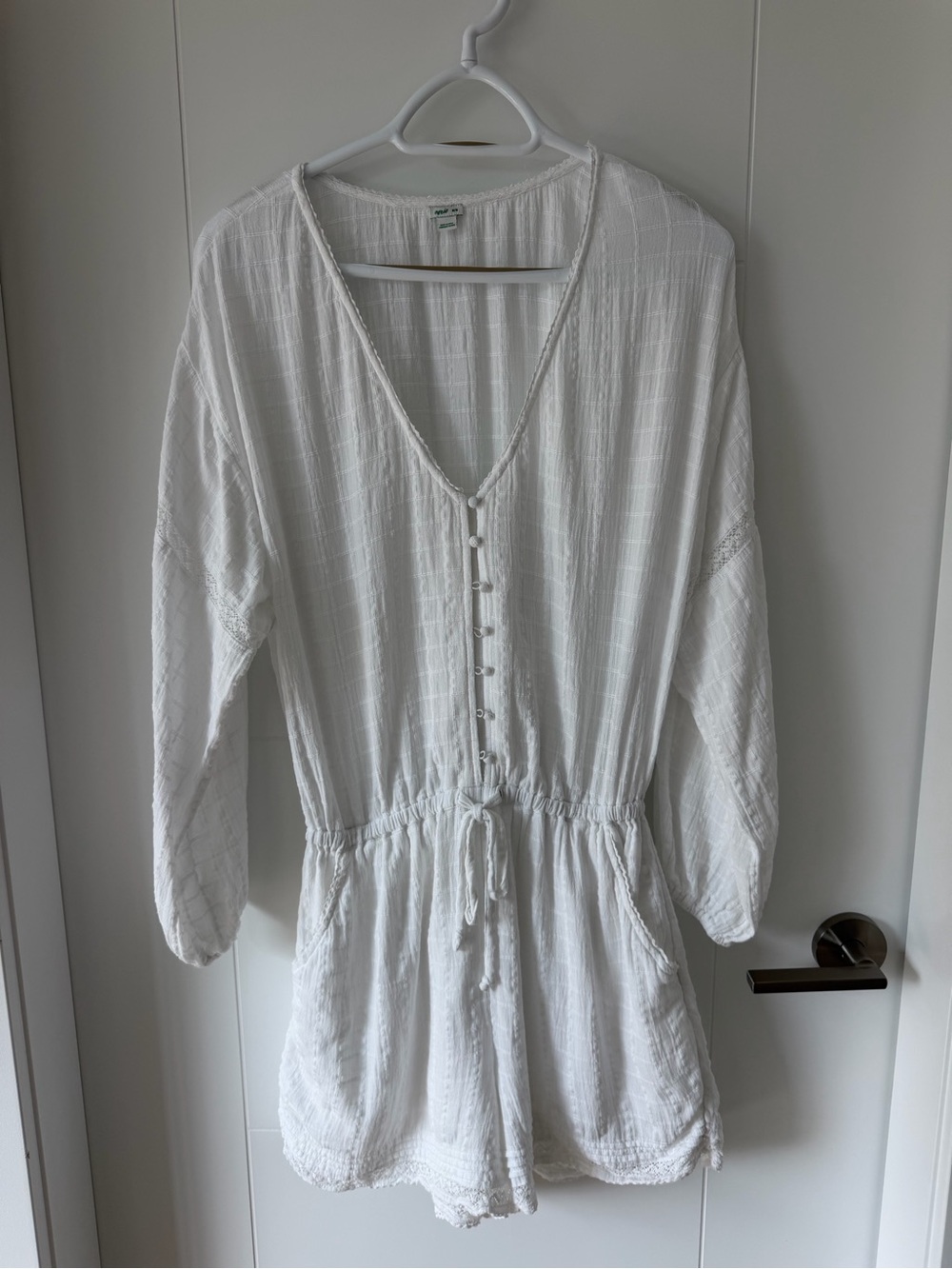 Breeze into summer with the Aerie White Cotton blend Gauze Romper. Size M